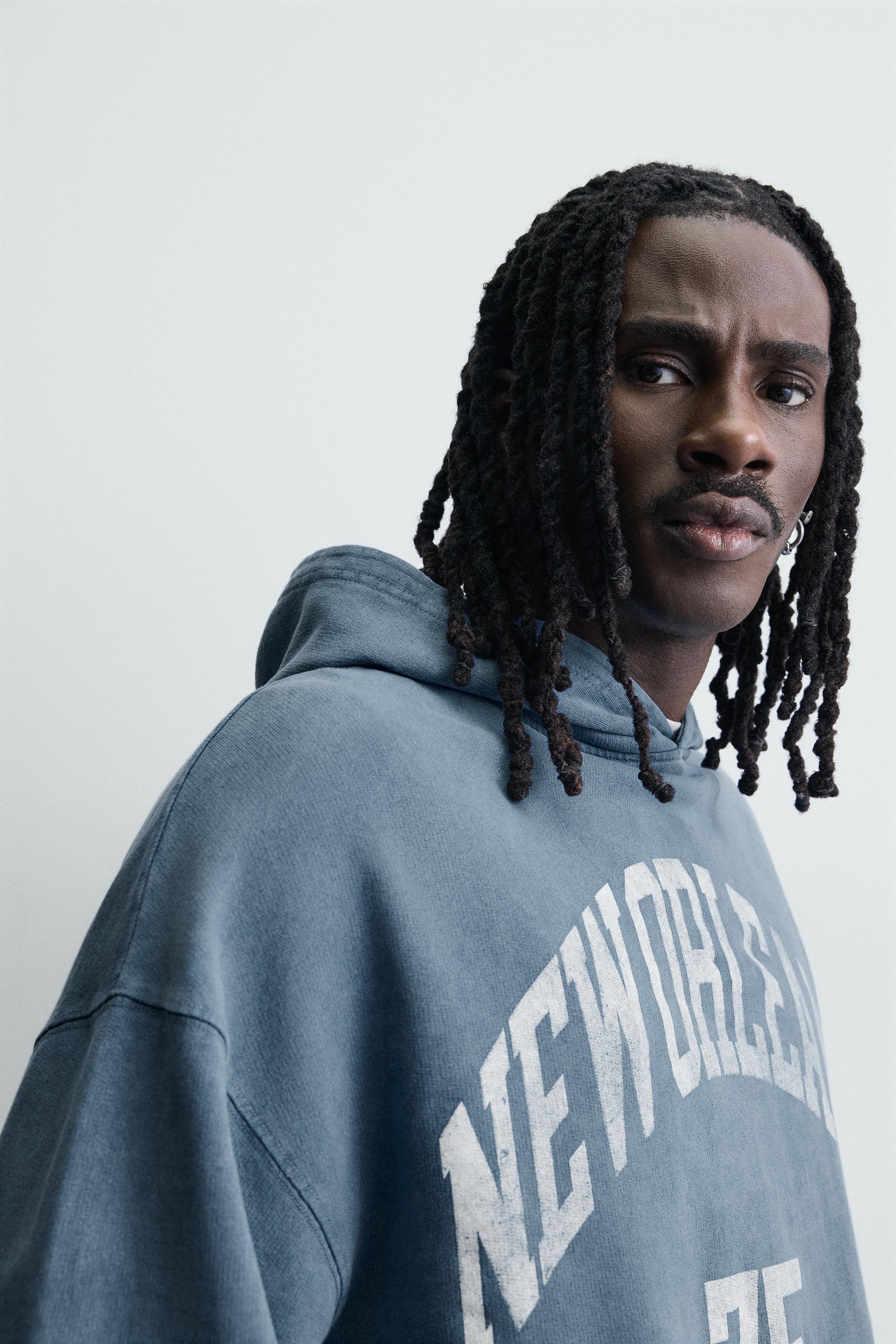 WASHED PRINTED TEXT SWEATSHIRT